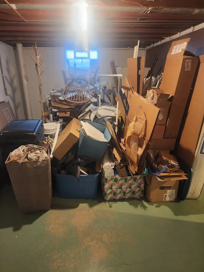 Roll-off dumpster container at job site for Yard Waste Dumpster Rental in St. Albans